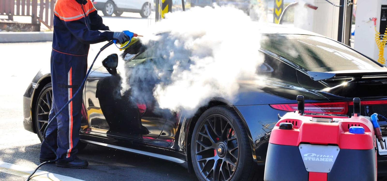 Professional steam cleaning car detailing service